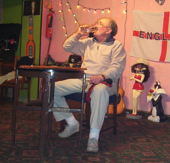 Gordon Cragg seated at bingo table drinking